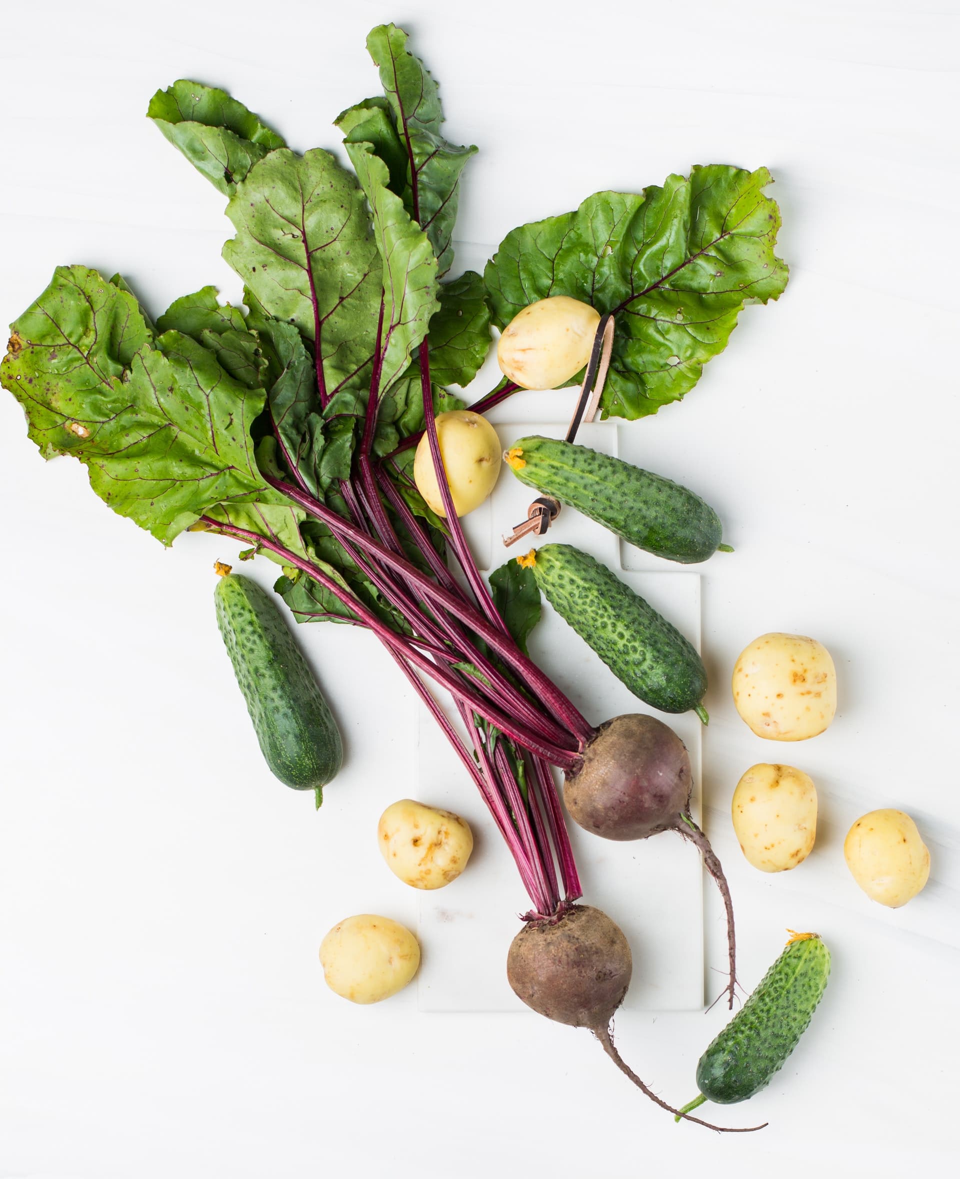 assorted-vegetables-on-white-surface-2611818.jpg